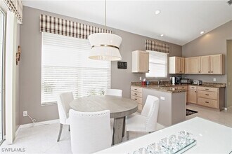 1842 Winding Oaks Way in Naples, FL - Building Photo - Building Photo