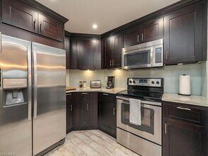1 Bluebill Ave, Unit 412 in Naples, FL - Building Photo - Building Photo