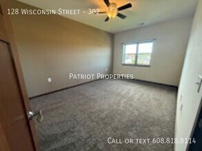 128 Wisconsin St in West Bend, WI - Building Photo - Building Photo