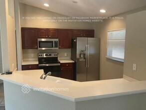 7699 Mclues Ave, Unit 1-208 in North Port, FL - Foto de edificio - Building Photo