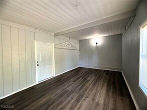 8239 Suncoast Dr in North Fort Myers, FL - Foto de edificio - Building Photo