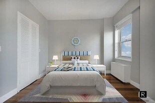 60 E 8th St in New York, NY - Building Photo