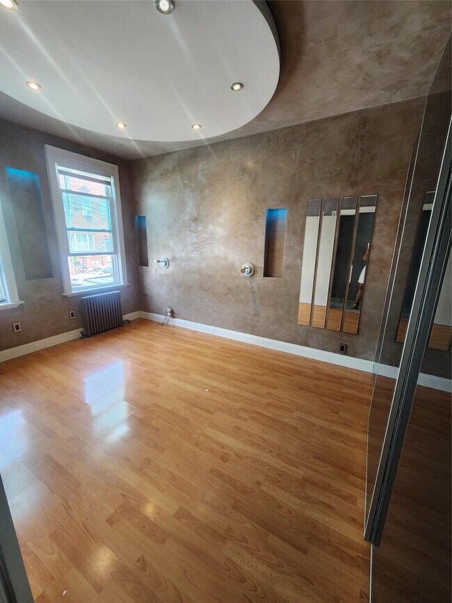 property at 90-16 83rd Ave