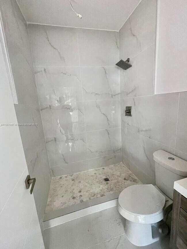 5734 Buchanan St-Unit -A in Hollywood, FL - Building Photo - Building Photo