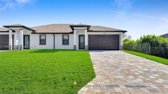 1123 Hightower Ave S in Lehigh Acres, FL - Building Photo - Building Photo