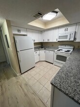 1515 Forrest Nelson Blvd, Unit O103 in Port Charlotte, FL - Building Photo - Building Photo