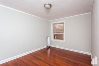 540 W Surf St, Unit 544.5-E1 in Chicago, IL - Building Photo - Building Photo