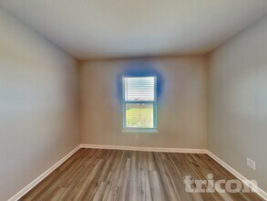 108 Saloon Cv E, Unit 104 in Newark, TX - Building Photo - Building Photo