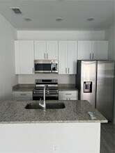 1584 Cumin Dr in Poinciana, FL - Foto de edificio - Building Photo