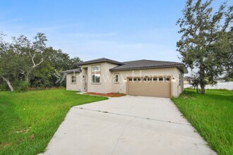 1951 Michigan Dr, Unit 7J in Poinciana, FL - Building Photo - Building Photo