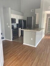 1226 Bermuda Lakes Ln-Unit -306 in Kissimmee, FL - Building Photo - Building Photo