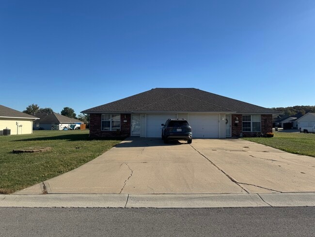 property at 1313 SW Blue Branch Dr