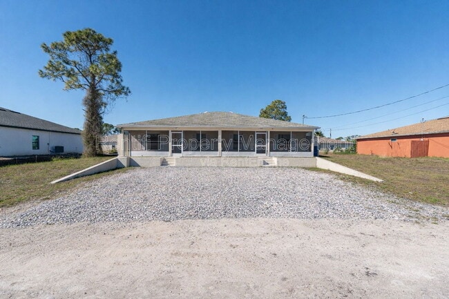 208 Ichabod Ave in Lehigh Acres, FL - Building Photo - Building Photo