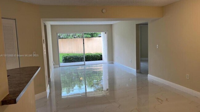 property at 6284 NW 186th St