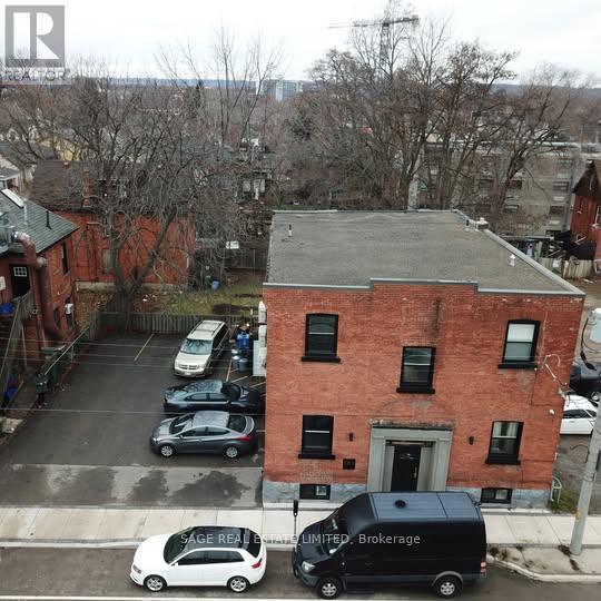 property at 90-90 Locke St S
