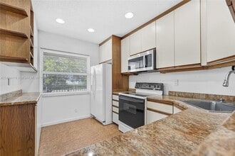 11160 W Sample Rd, Unit 11160 in Coral Springs, FL - Building Photo - Building Photo