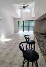 1353 Pine Ridge Cir E, Unit 128 E3 in Tarpon Springs, FL - Building Photo - Building Photo