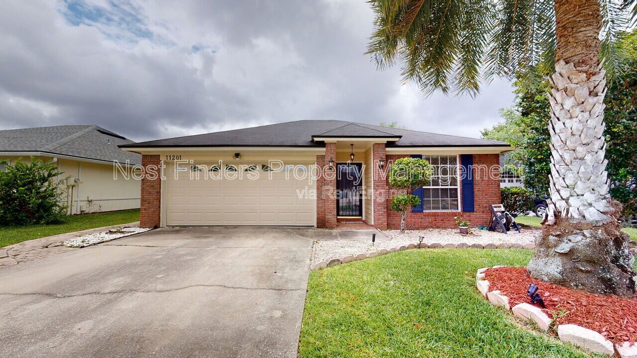 11201 Wandering Oaks Dr in Jacksonville, FL - Foto de edificio
