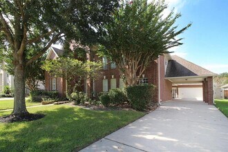 18811 Cypress Chateau Dr in Spring, TX - Foto de edificio - Building Photo