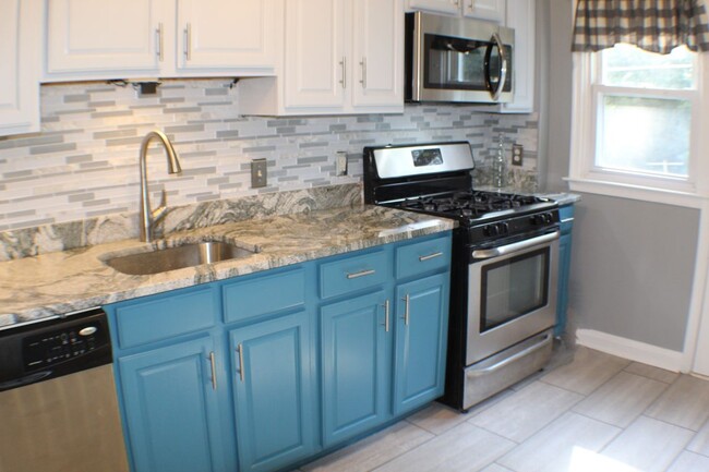1457 N Forest Park Ave in Baltimore, MD - Building Photo - Building Photo