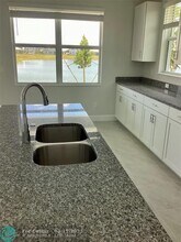 14046 Spruce Pne Dr in Westlake, FL - Building Photo - Building Photo
