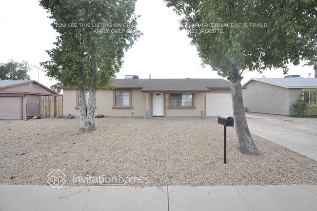 property at 3643 E Surrey Ave