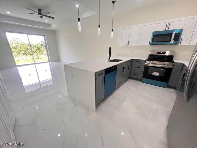 1598 Gretchen Ave S in Lehigh Acres, FL - Building Photo - Building Photo