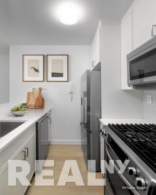 115 E 34th St in New York, NY - Building Photo - Building Photo