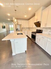13360 Arrowbrook Centre Dr in Herndon, VA - Building Photo - Building Photo