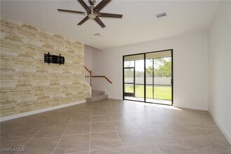 14103 Pine Lodge Ln in Miromar Lakes, FL - Building Photo - Building Photo