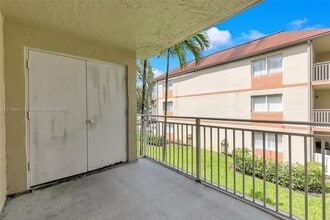18860 NW 57th Ave, Unit 204 in Hialeah, FL - Building Photo - Building Photo