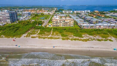 3060 N Atlantic Ave, Unit 111 in Cocoa Beach, FL - Building Photo - Building Photo
