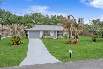 841 NW Riverside Dr in Port St. Lucie, FL - Building Photo - Building Photo