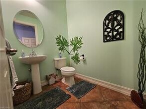9159 Delano St-Unit -99-2 in Naples, FL - Foto de edificio - Building Photo