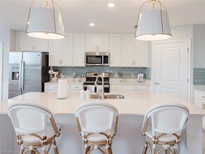 5467 Double Eagle Cir, Unit 1B-625 in Ave Maria, FL - Building Photo - Building Photo