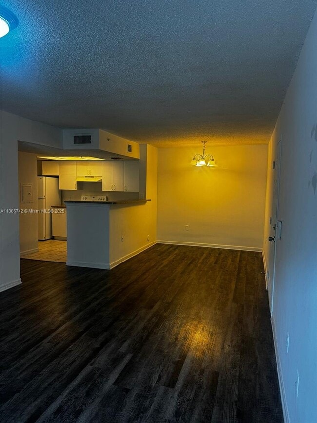 5035 Wiles Rd in Coconut Creek, FL - Building Photo - Building Photo