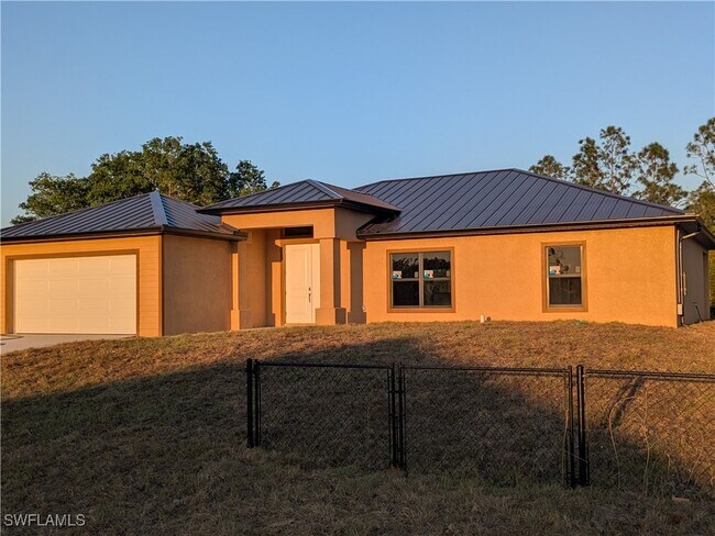 1034 Chauncey Ave in Lehigh Acres, FL - Building Photo - Building Photo