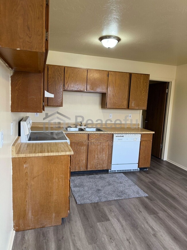 4693 S Arlington Park Dr in West Valley City, UT - Building Photo - Building Photo