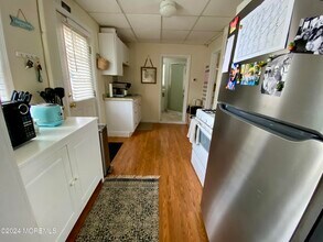 121 Woodland Ln-Unit -Rear Downstairs in Avon By The Sea, NJ - Building Photo - Building Photo
