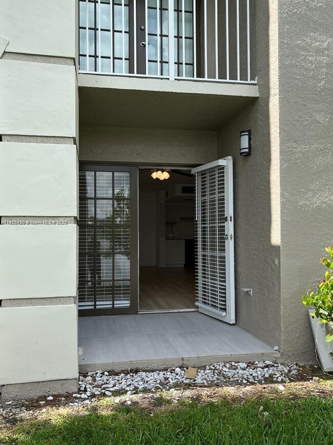 5001 Wiles Rd in Coconut Creek, FL - Building Photo - Building Photo