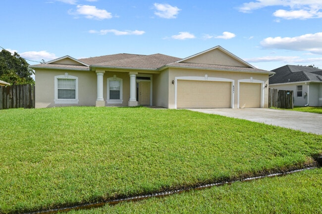 property at 6221 NW Hacienda Ln