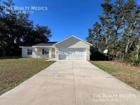 405 Malauka Loop in Ocklawaha, FL - Building Photo - Building Photo