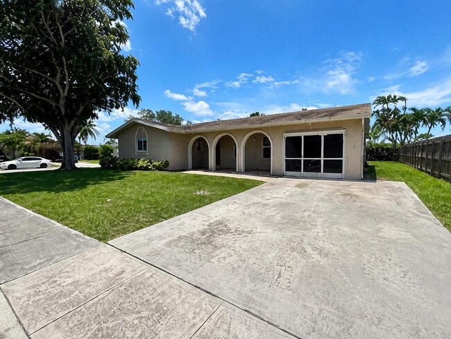 property at 7975 NW 8th St