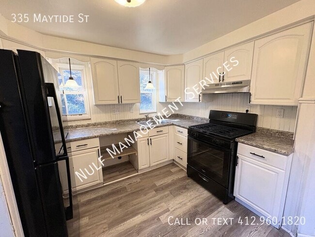 property at 335 Maytide St