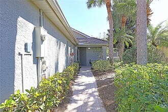 1579 Whispering Oaks Cir in Naples, FL - Building Photo - Building Photo