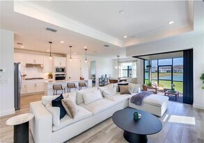 20419 Pebble Gln Dr, Unit 201-1207 in Estero, FL - Building Photo