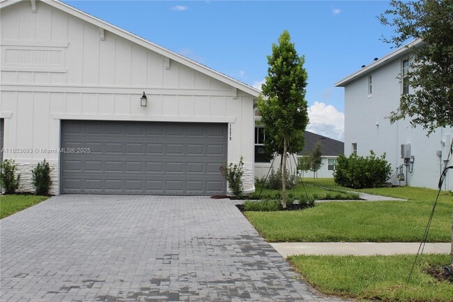 1379 Tangled Orchard Tr in Loxahatchee, FL - Building Photo - Building Photo