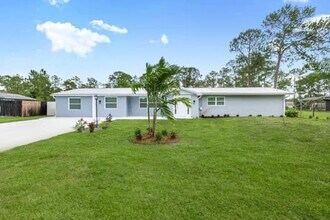 1214 Eighth Ave in Lehigh Acres, FL - Building Photo - Building Photo