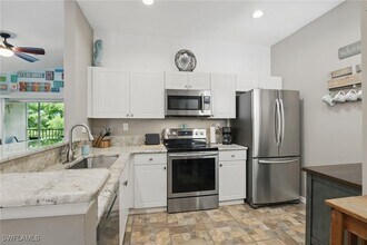 15430 Bellamar Cir, Unit 3023 in Ft. Myers, FL - Building Photo - Building Photo