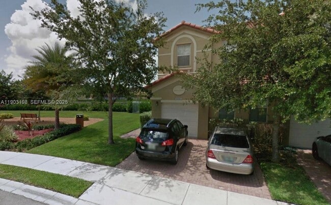 property at 10983 NW 79th St